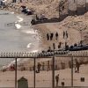 Ceuta, migranti vicino il confine: il Marocco li disperde con lacrimogeni